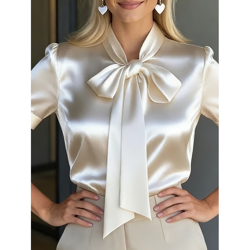 Women Formal Wear Shirts - เสื้อเชิ้ตแขนสั้นผู้หญิงแบบหรูหราพร้อมคอปกผูกโบว์ สีพื้น เนื้อผ้าซาติน เหมาะสำหรับใส่ทำงานหรือในโอกาสทางการ